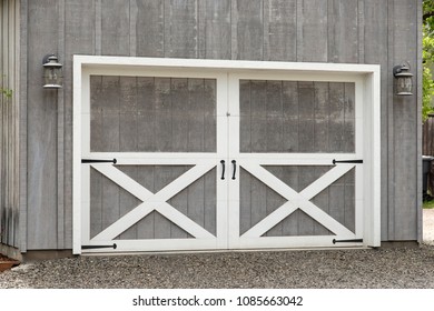 Garage Door With White Trim And Black Hardware