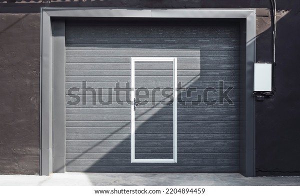 Garage Doors,\
Vehicle roller door set in\
wall