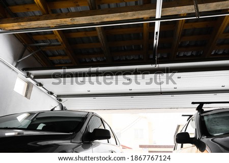Garage entrance with sectional doors. view of the automatic garage door from the inside