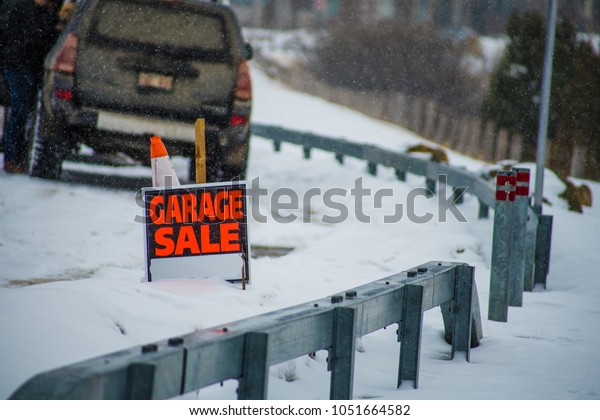 Garage Sale Sign in Winter\
Snow