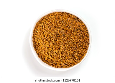 Garam Masala Powder On A Ceramic Bowl, Isolated On White Background - Top View
