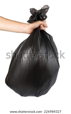 garbage bag in hand