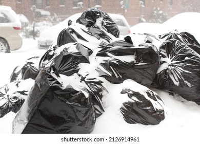 Garbage Bags Under Snow On The Street At New York City