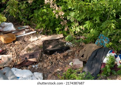 Garbage Being Dumped And Stored In A Vacant Downtown Residential Lot, Raising Issues Of City Waste Management And Public Health