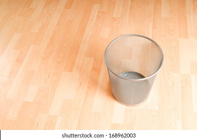 Garbage bin with paper waste isolated on white 