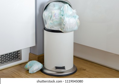 Garbage Can Full Of  Used Dirty Diapers 
