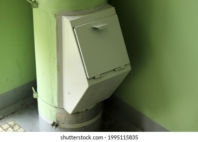 Garbage Chute In An Apartment Building