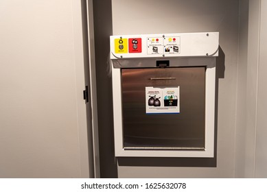 Garbage Chute Door In Apartment Building