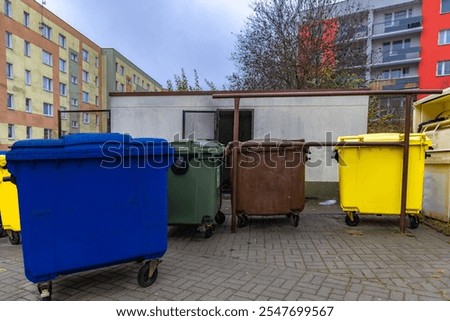 Garbage containers destroyed in a fire, a fire started in a garbage can in a residential estate, fire hazard