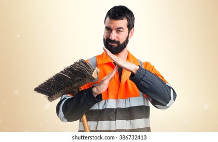 Garbage Man Making Time Out Gesture