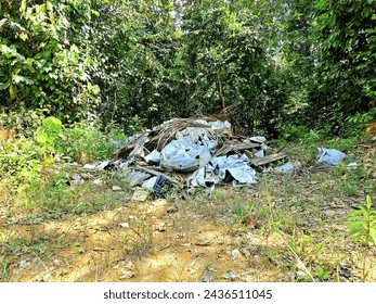 Garbage near the jungle, environment pollution 