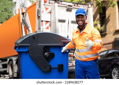 Garbage Removal Man Doing Trash And Rubbish Collection