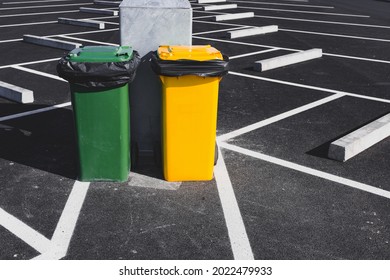 Garbage Solid Waste Container In Car Parking Lot, Separate Bins Trash Containers In The City Park. Rubbish Garbage For Hygienic Health Public Outdoor Parking. Zero Waste And Sustainable Environment