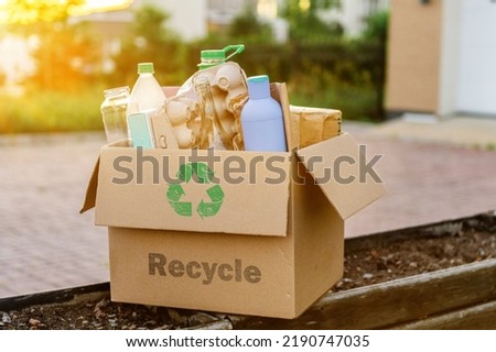 Garbage for sorting and recycling in a box. The concept of caring for the environment and ecology. High quality photo