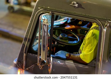 Garbage Truck Driver With A Blue Rubber Glows Visible In A Car Window, Manhattan, New York, United States, 09.20.2021