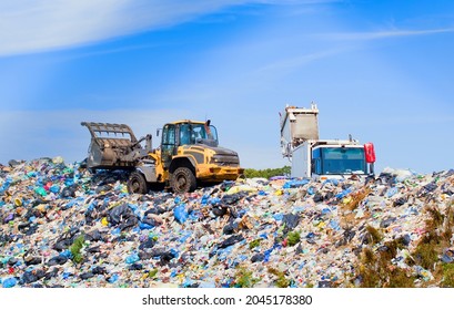 Garbage Truck Unloading At A Landfill