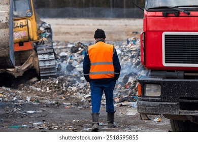 Garbage truck unloads rubbish in landfill. Landfill with waste disposal, Garbage dump. - Powered by Shutterstock