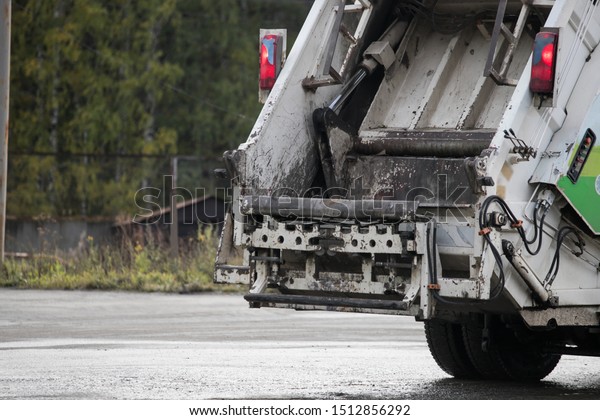 Garbage trucks in the\
city, garbage removal