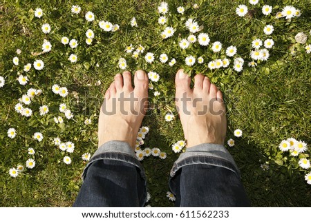 Image, Stock Photo bare feet on green meadow with white and yellow flowers