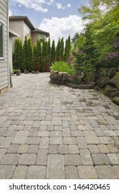 Garden Backyard Hardscape Brick Pavers Patio With Pond Trees Natural Rocks Landscaping