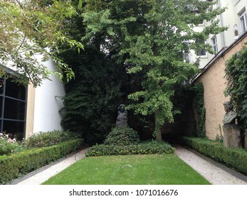 A Garden With A Bust Of Beethoven