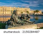 Garden of Chateau de Versailles, near Paris in France at sunset