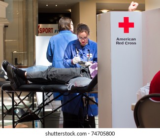 GARDEN CITY, NY - APRIL 3, 2011:  In The Wake Of The Devastation In Japan, American Red Cross Blood Drive For Disaster Relief In Garden City, New York In Roosevelt Field Mall.