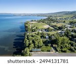 Garden City, Utah summer sunset along Bear Lake shores drone landscape