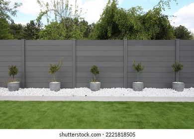 Garden with Composite Fencing Background - Shutterstock ID 2221818505