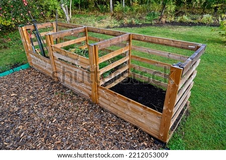 garden compost with three compartments in garden