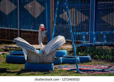 Garden decor. White swan made of tire - Powered by Shutterstock