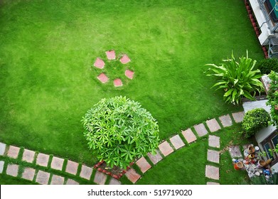 Garden Detail In Aerial View With Stone Walkway