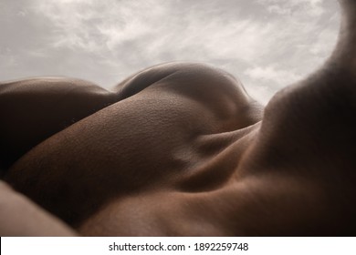 Garden. Detailed Texture Of Human Skin. Close Up Of Young African-american Male Body Surface Like Landscape With The Sky On Background. Skincare, Bodycare, Healthcare, Inspiration, Fantasy Artwork.