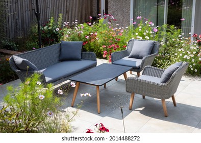 Garden furniture on the terrace on sunny day - Shutterstock ID 2014488272