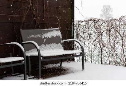 Garden Furniture Under The Snow. Winter Precipitation And A Thick Layer Of Snow On The Garden Furniture.