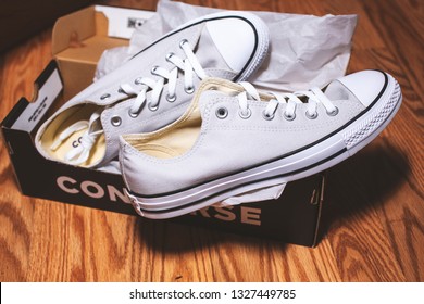 Garden Grove, California/United States - 02/26/19: A Pair Of Grey Brand New Converse Shoes With The Box On The Floor