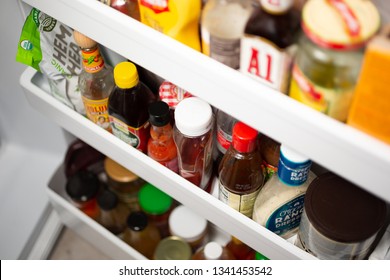 Garden Grove, California/United States - 03/17/2019: A Refrigerator Shelf Full Of Condiments 