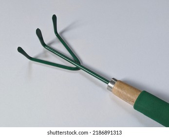 Garden Hand Rake Shrub Leaf On Isolated Background. Leaves Remover Gardening Tools.