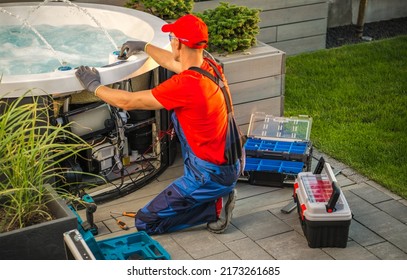 Garden Hot Tubs Servicing and Scheduled Maintenance Performed by Caucasian Professional SPA Technician - Shutterstock ID 2173261685