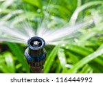 Garden irrigation system watering lawn