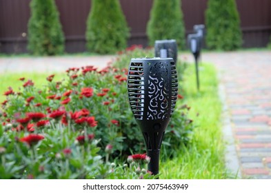garden light bulbs for garden design are installed on the lawn - Shutterstock ID 2075463949