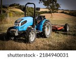 Garden mini tractor on the field, lawn tractors, outdoors