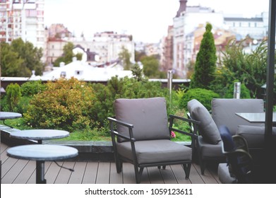 Garden On The Roof. Modern Terrace Design With Sofa. Home Interior Of Living Room. Green Terrace On The Roof Of The House. Rooftop Of Penthouse. 