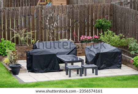 Garden plant display and outdoor furniture during summer