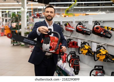 Garden Power Tool Shop Manager Offers Red Colored Chainsaw