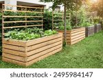 Garden Raised Beds in Vegetable Garden. Modern Gardening. Wooden High Garden Beds with Vegetable Plants.