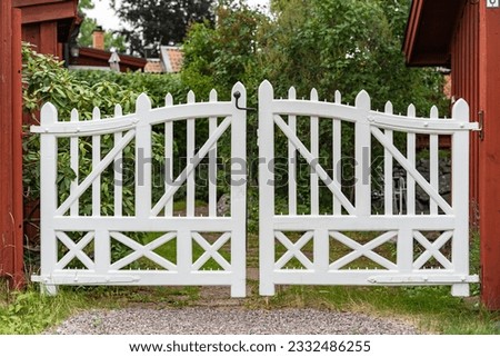 Similar – Image, Stock Photo Gate entrance with old wrought iron gate and crumbling plaster with brickwork in the old courtyard entrance of an old building on Hanauer Landstraße in the Ostend district of Frankfurt am Main in Hesse
