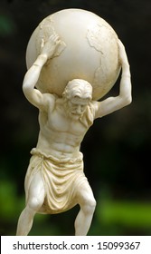 Garden Statue Of Atlas Holding The World On His Shoulders