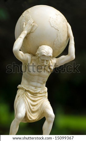 Garden statue of Atlas holding the world on his shoulders