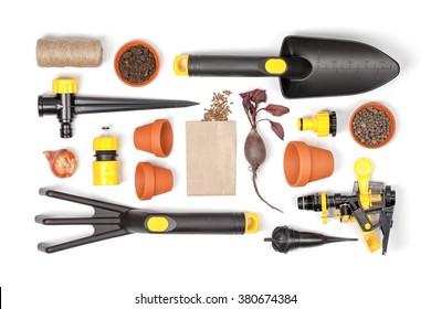 Garden Tools And Essentials On White Background Top View. Gardening Flat Lay Concept